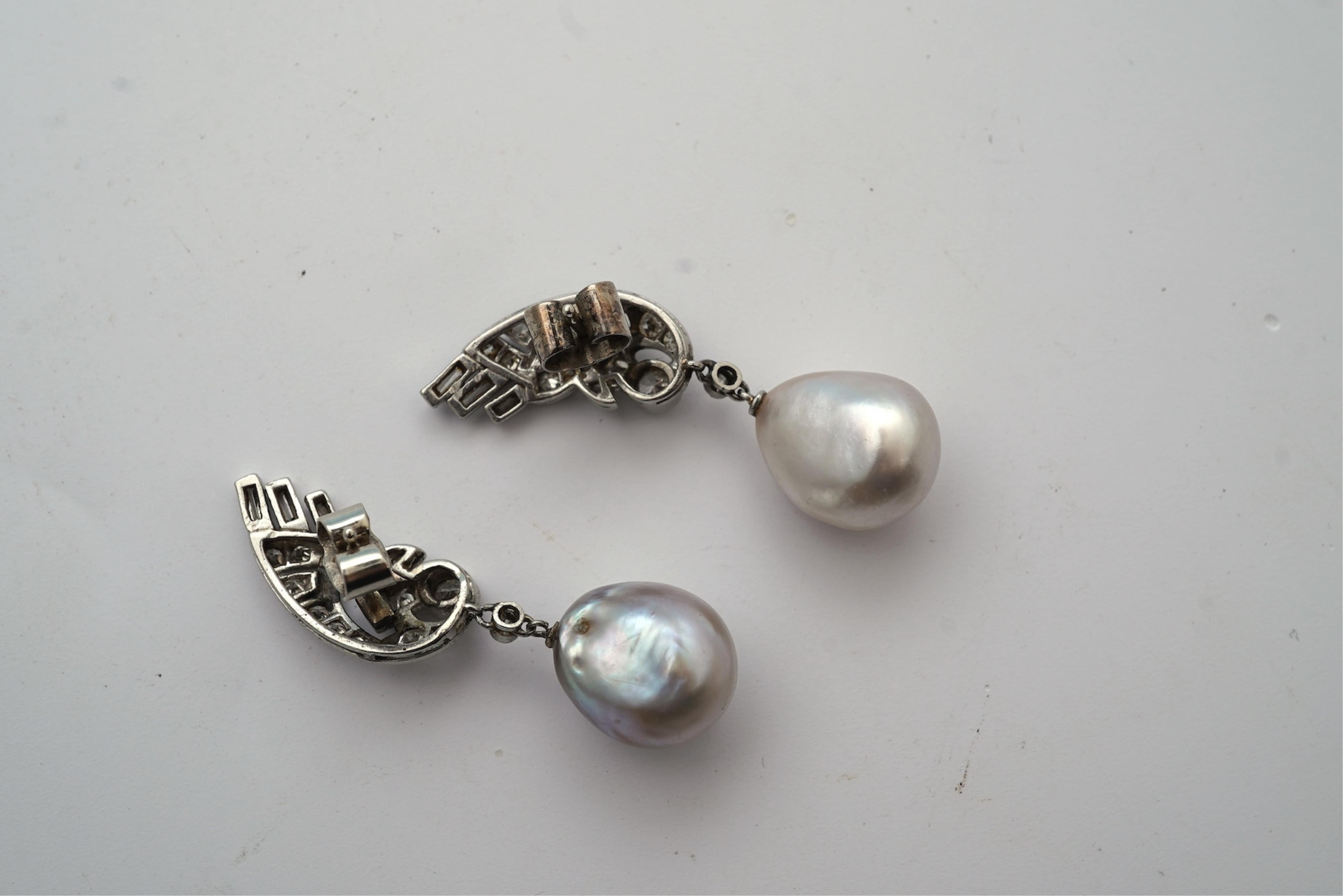 A fine pair of Art Deco natural pearl and diamond earrings, 1930s